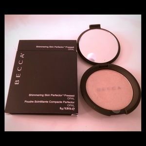 Brand new! Becca Opal pressed highlighter.